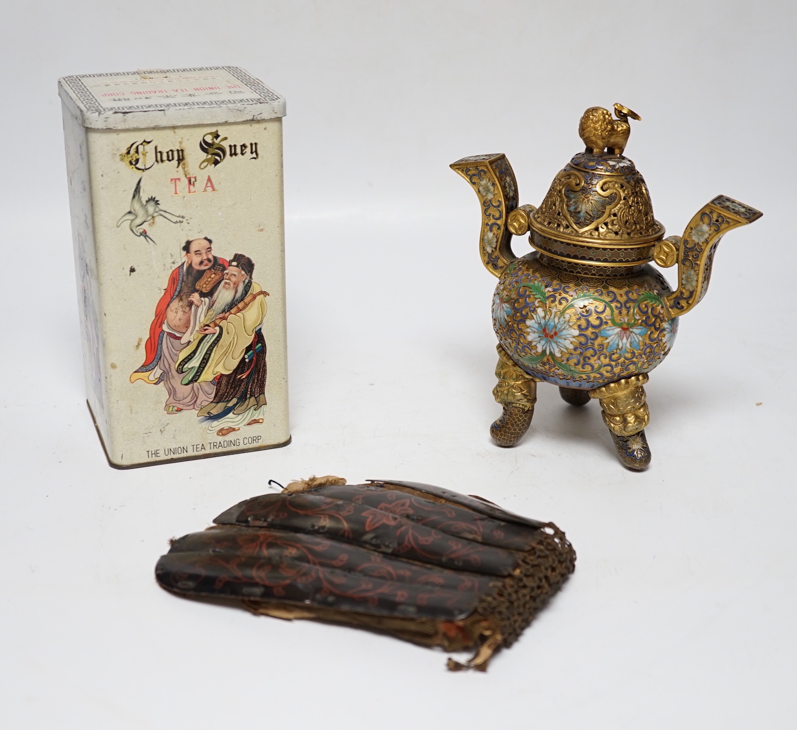A Chinese cloisonné enamel censer and cover, a tea box containing four tea tins, and a Japanese lacquer and chain mail gauntlet/glove front, censor 18cm high